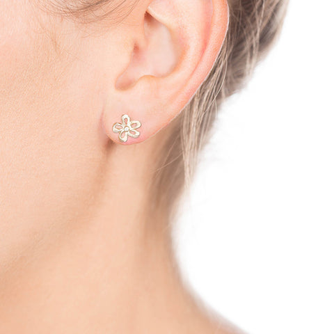 Gold Flower Diamond Studs on Person