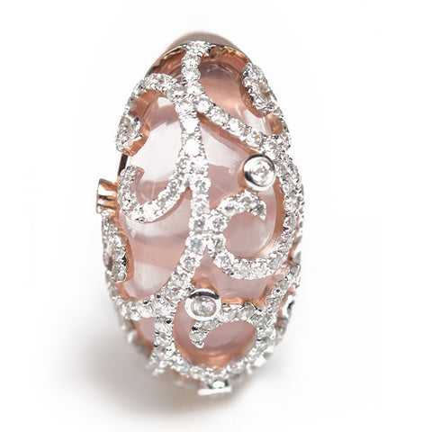 rose quartz and diamond studs close up